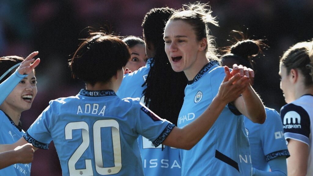 Aoba Fujino and Vivianne Miedema celebrate together