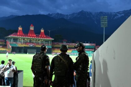 Security personnel guarding at the HPCA Stadium on the eve of the IPL Match between Punjab KIngs and Delhi Capitals at Dharamshala in Himachal Pradesh on Wednesday. Express Photo by Rohit Jain Paras