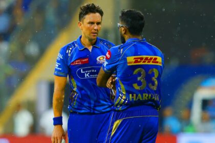 MI vs GT: Raindrops are seen as Trent Boult and Hardik Pandya of Mumbai Indians speak during an IPL 2025 match between Mumbai Indians and Gujarat Titans at the Wankhede Stadium. (Sportzpics for IPL)
