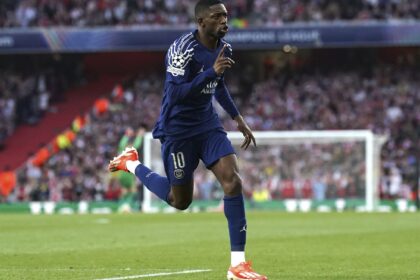 PSG's Ousmane Dembele celebrates after scoring the opening goal during the Champions League semifinal first leg between Arsenal and Paris Saint-Germain at Emirates Stadium. (PA via AP)
