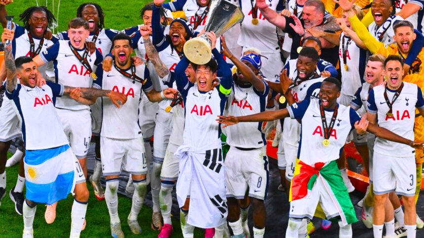 Tottenham Hotspur's Son Heung-Min raises the Europa League trophy after Spurs won the final against Manchester United at the San Mamés Stadium in Bilbao. (AP Photo)