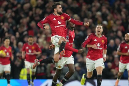 Manchester United's Bruno Fernandes celebrates after scoring during a Premier League match against Bournemouth. (PHOTO: AP)