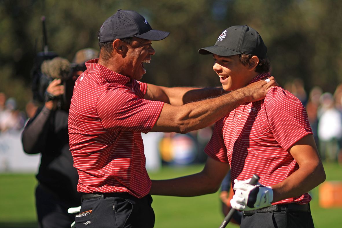 Woods and his son, Charlie, react at the PNC Championship after Charlie made a hole-in-one in December 2024. The father-son duo <a href="https://www.cnn.com/2024/12/22/sport/tiger-woods-charlie-woods-hole-in-one-pnc-championship-spt">finished the tournament tied for second</a> after losing in a playoff.