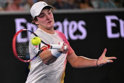 João Fonseca hits a forehand while playing Andrey Rublev at the Australian Open in January.
