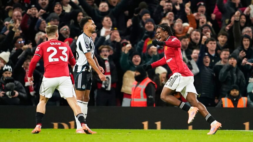 Manchester United's Patrick Dorgu, right, celebrates after scoring the opening goal during the English Premier League match vs Newcastle. (PHOTO: AP)