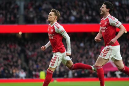 Martin Odegaard celebrates goal with Declan Rice against Brighton. (PHOTO: AP)