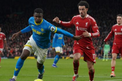 Wolverhampton Wanderers' Yerson Mosquera, left, duels for the ball with Liverpool's Curtis Jones during the English Premier League match. (PHOTO: AP)