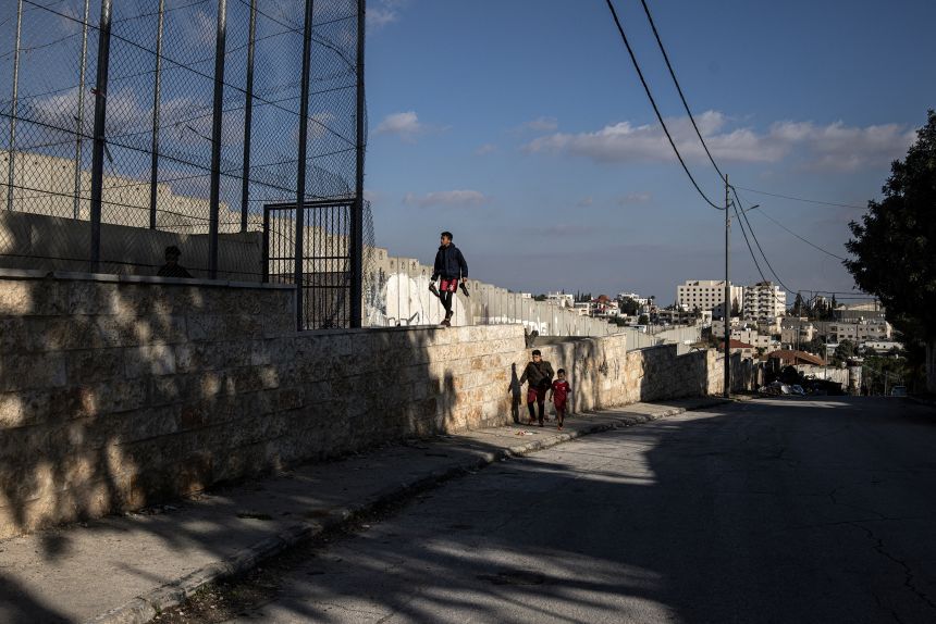 Palestinian children make their way to Aida pitch in mid December.