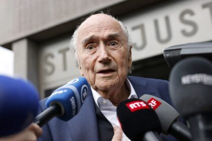 Former FIFA President Sepp Blatter speaks with members of the media in Muttenz, Switzerland, on March 25, 2025.