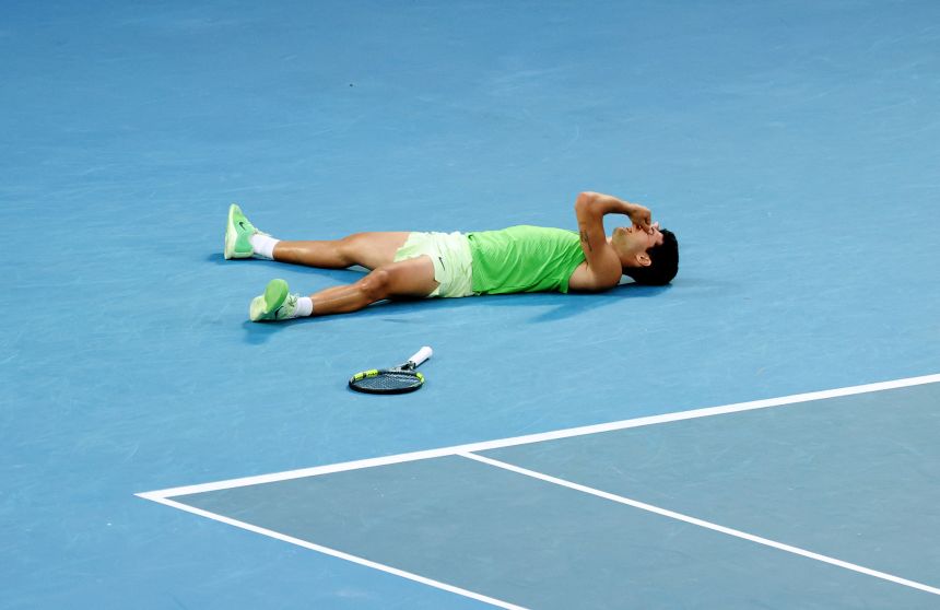 Carlos Alcaraz fell to the floor after winning his epic semifinal match against Alexander Zverev.