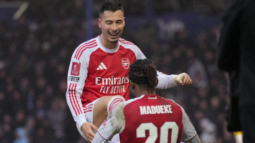 Arsenal's Gabriel Martinelli and Noni Madueke celebrate after a goal during the FA Cup third round soccer match between Portsmouth and Arsenal in Portsmouth, England, Sunday, Jan. 11, 2026. (AP Photo)