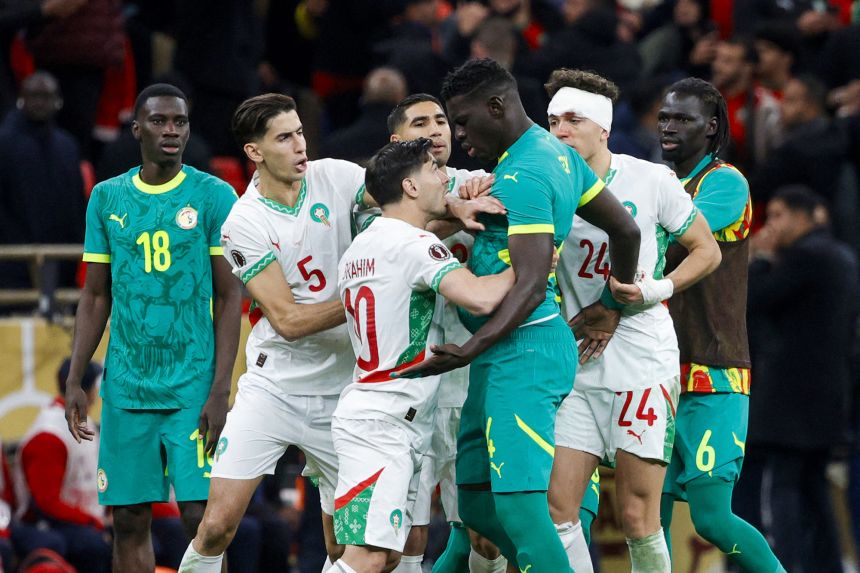 Senegal and Morocco players clash during the AFCON final.