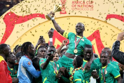 Senegal players raise the trophy after winning the 35th Africa Cup of Nations (AFCON 2025) final match against Morocco at the Prince Moulay Abdellah Stadium in Rabat, Morocco on January 19.