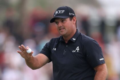 Patrick Reed acknowledges the crowd after winning the Dubai Desert Classic on Sunday.