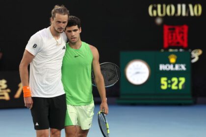 Carlos Alcaraz, right, embraces Alexander Zverev after his victory at Melbourne Park on Friday.