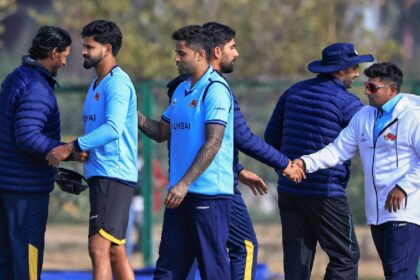Mumbai's Shreyas Iyer, Suryakumar Yadav and Sarfaraz Khan exchange greetings with Punjab players after the former team won the Vijay Hazare Trophy 2025-26 cricket match against Punjab, at Jaipuria Vidyalaya Ground, in Jaipur, Thursday, Jan. 8, 2026. (PTI Photo)