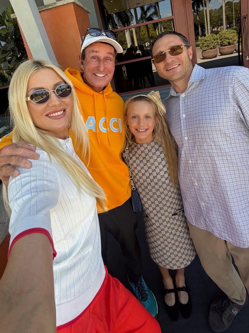 Vlada Hranchar’s mom Maryna (left), coach Rick Macci (second left) and dad Dmytro (right) pose with the tennis prodigy.