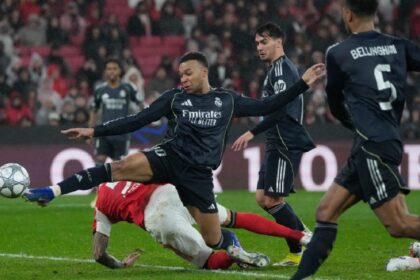 Real Madrid's Kylian Mbappe attempts a shoot at goal during a Champions League opening phase soccer match between Benfica and Real Madrid, in Lisbon. (AP Photo)