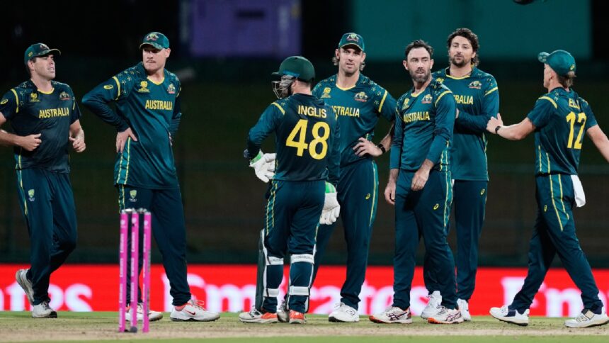 Australia's Glenn Maxwell, centre, celebrates with teammates the wicket of Oman's Jiten Ramanandi during the T20 World Cup cricket match between Australia and Oman in Pallekele, Sri Lanka. (AP Photo)
