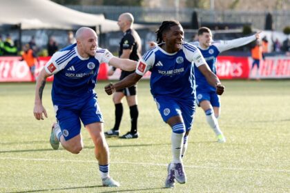 Macclesfield FC's Isaac Buckley-Ricketts celebrates scoring their second goal with Josh Kay.