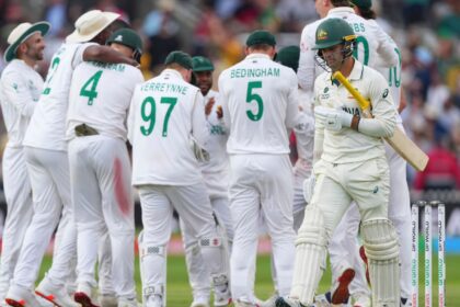 South Africa players celebrate as Australia's Alex Carey, right, walks off the field after losing his wicket on day two of the World Test Championship final between South Africa and Australia at Lord's cricket ground in London, Thursday, June 12, 2025. (AP Photo/Kirsty Wigglesworth)