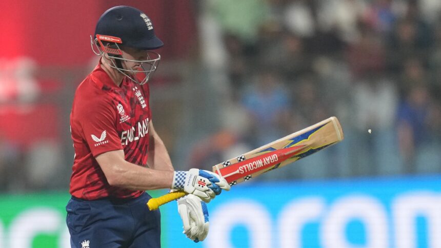 England's captain Harry Brook leaves the ground after losing his wicket during the T20 World Cup cricket match between England and West Indies in Mumbai, India, Wednesday, Feb. 11, 2026. (AP Photo)