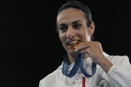 Gold medalist Algeria's Imane Khelif poses during a medals ceremony for the women's 66 kg final boxing match at the 2024 Summer Olympics