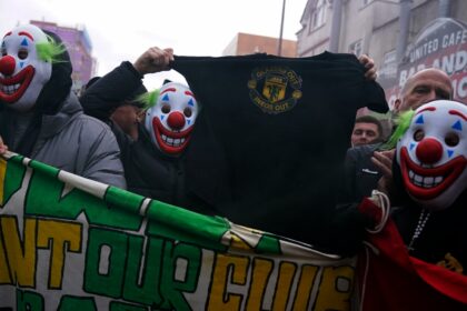 Manchester United fans protest against the club's owners, the Glazer family, prior to the Premier League match against Fulham (PHOTO: AP)