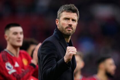 Manchester United's head coach Michael Carrick celebrates at the end of the English Premier League soccer match between Manchester United and Fulham in Manchester, England, Sunday, Feb. 1, 2026. (AP Photo)