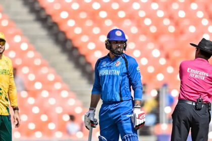 Afghanistan's Mohammad Nabi engaged in a prolonged argument with umpires regarding South African bowler Lungi Ngidi’s wrist band. (PHOTO: ICC)