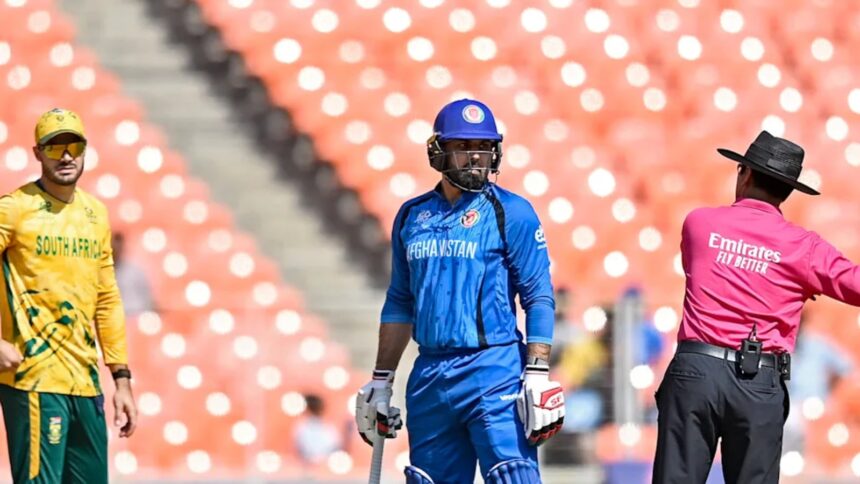 Afghanistan's Mohammad Nabi engaged in a prolonged argument with umpires regarding South African bowler Lungi Ngidi’s wrist band. (PHOTO: ICC)