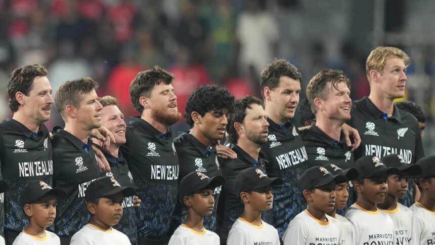 The New Zealand players couldn't help but crack up as their national anthem was played. (AP Photo)