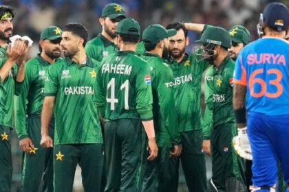 Pakistan's players wait for the third umpire's decision for the wicket of India's captain Suryakumar Yadav, right, during the T20 World Cup cricket match between India and Pakistan in Colombo, Sri Lanka. (AP Photo)