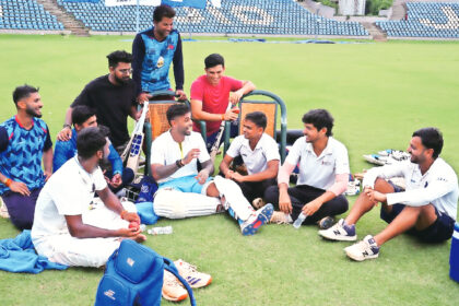 Siddhant Adhatrao (2nd from left) looks on as Suryakumar Yadav holds court after practice at the Reliance ground in Mumbai.