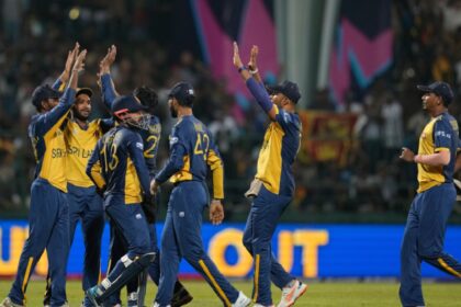 Sri Lanka's players celebrates the wicket of Australia's Tim David during the T20 World Cup cricket match between Sri Lanka and Australia in Pallekele, Sri Lanka, Monday, Feb. 16, 2026. (AP Photo)