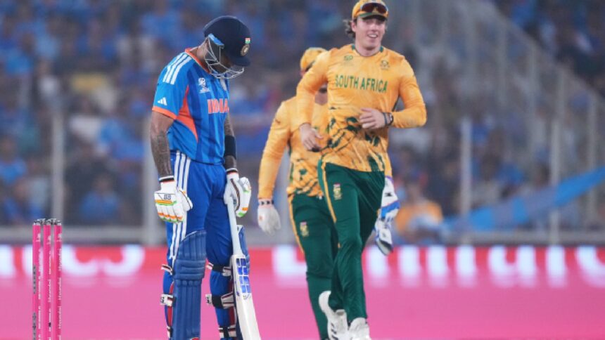 India's captain Suryakumar Yadav, left, reacts after losing his wicket during the T20 World Cup cricket match between India and South Africa in Ahmedabad. (AP Photo)