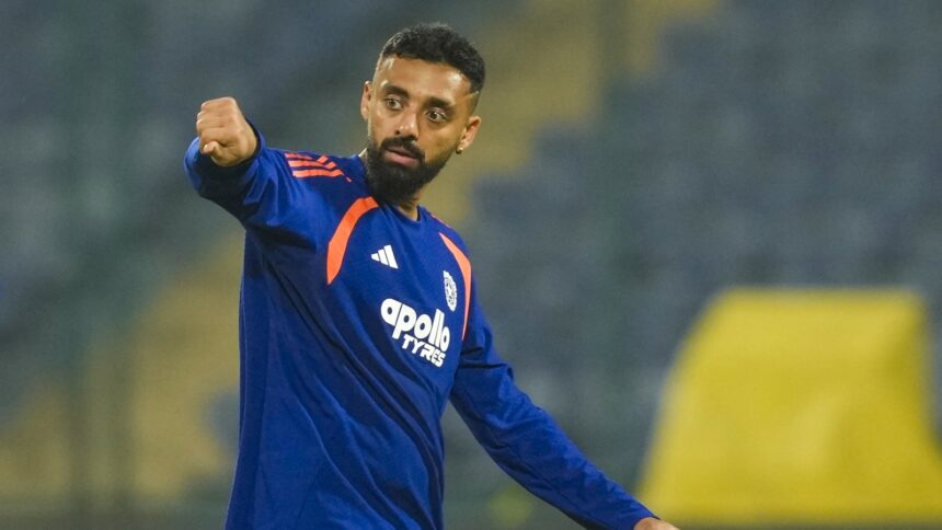 Varun Chakaravarthy's ability to consistently bowl on the good length, varying his speed and mixing his leg-spinners and googlies makes it a daunting task for the batters to pick him. (PTI Photo)