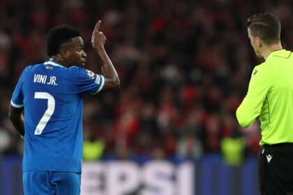 The atmosphere grew hostile after play resumed, with Vinicius and Mbappe loudly booed by the home crowd whenever they touched the ball. (AP Photo)