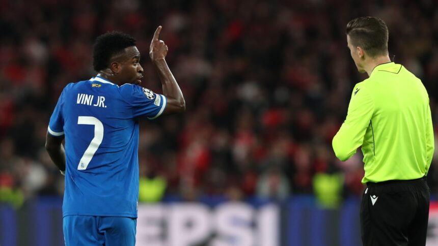 The atmosphere grew hostile after play resumed, with Vinicius and Mbappe loudly booed by the home crowd whenever they touched the ball. (AP Photo)