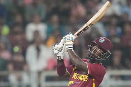 West Indies' Sherfane Rutherford plays a shot during the T20 World Cup cricket match between England and West Indies in Mumbai. (AP Photo)