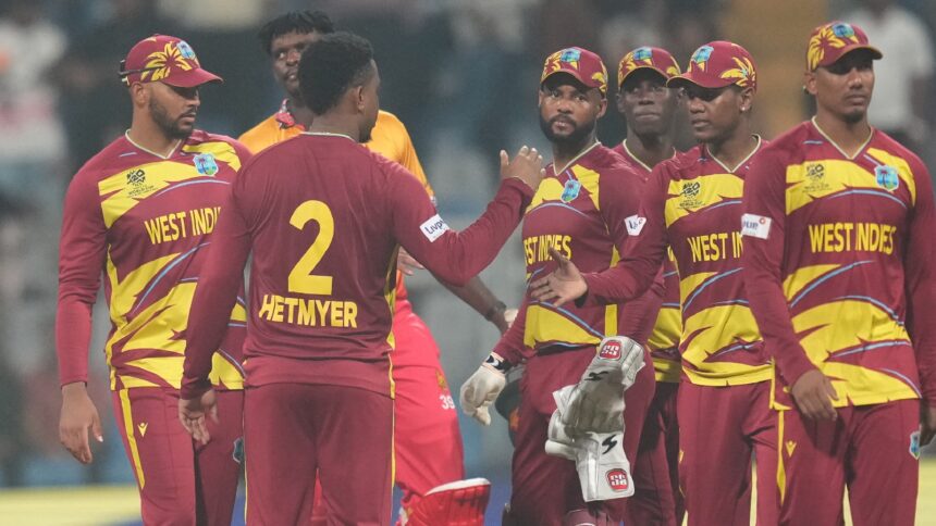 Shai Hope's West Indies celebrate after their win against Zimbabwe during the T20 World Cup cricket match in Mumbai. (AP Photo)