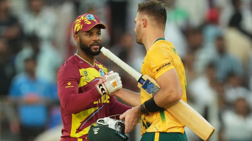T20 World Cup 2026 Points Table Super 8: South Africa's Aiden Markram is congratulated by West Indies' Shai Hope after South Africa won their T20 World Cup cricket match in Ahmedabad. (AP Photo)