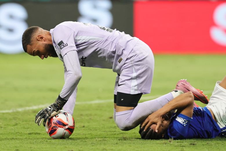 The brawl was sparked by a challenge by Cruzeiro midfielder Christian on Atletico goalkeeper Everson. Everson responded by rugby-tackling Christian and dropping both knees into his head.