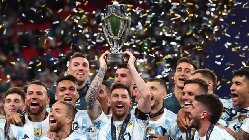 Argentina's Lionel Messi celebrates with the trophy and teammates after winning the Finalissima 2022. (PHOTO: FILE/Reuters)