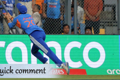 India's Axar Patel catches the ball in the T20 World Cup semi-final against England at Mumbai's Wankhede Stadium. (Express photo Narendra Vaskar)