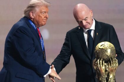 FIFA's AI plans for World Cup: President Gianni Infantino presents President Donald Trump with the FIFA Peace Prize during the draw for the 2026 soccer World Cup at the Kennedy Center in Washington, Friday, Dec. 5, 2025. (AP Photo)