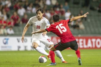 Forward Sardar Azmoun playing in a match against Hong Kong at Hong Kong Stadium on June 6, 2024.