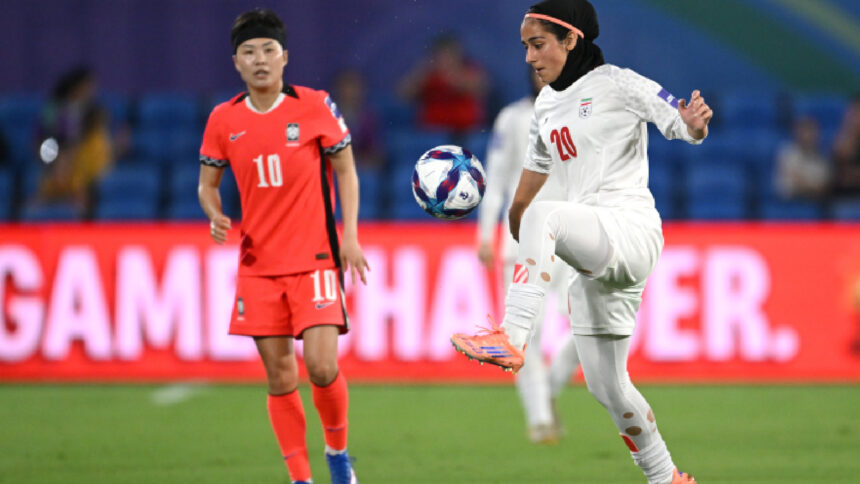 Iran's Sara Didar attempts to control the ball during the Women's Asia Cup soccer match between Iran and South Korea on the Gold Coast, Australia, Monday, March 2, 2026. (Dave Hunt/AAPImage via AP)