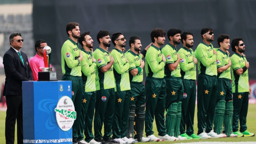 Pakistan's players stand up for the national anthem before the start of the first one day international cricket match between Bangladesh and Pakistan in Mirpur, Bangladesh, Wednesday, March 11, 2026. (AP Photo/Mahmud Hossain Opu)