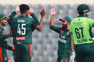 Bangladesh's Nahid Rana, centre, celebrates with teammates the wicket of Pakistan's Mohammad Rizwan during the first one day international cricket match between Bangladesh and Pakistan in Mirpur, Bangladesh, Wednesday, March 11, 2026. (AP Photo)